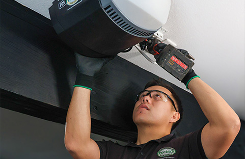 Technician Installing Opener